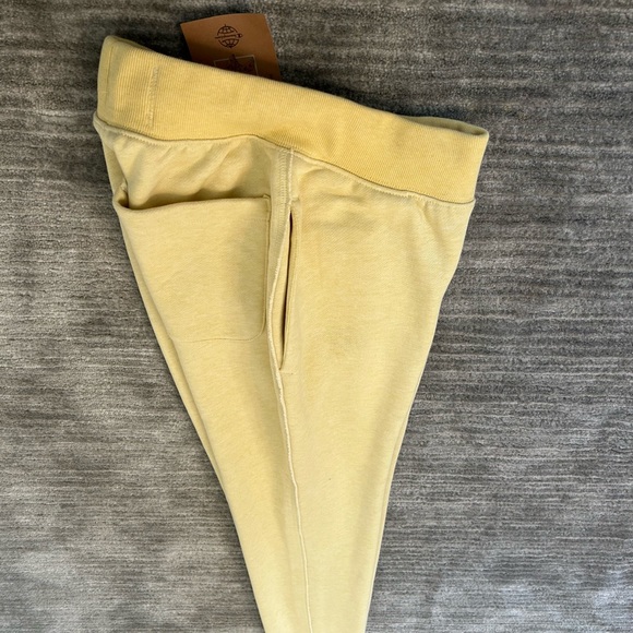 Champion reverse weave men’s slim jogger fleece pant in pale yellow size XS - Picture 6 of 6